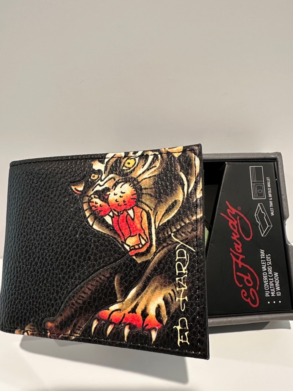 NWT Ed Hardy Men’s Bifold Wallet with Card, ID, Coin and Bill slots.